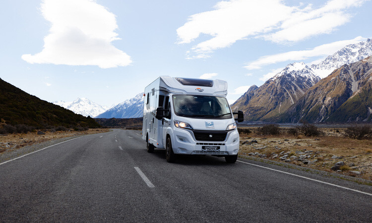 A motorhome being driven on the road