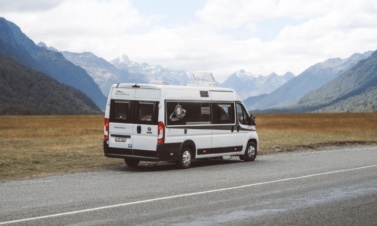 A campervan parked at the side of a road