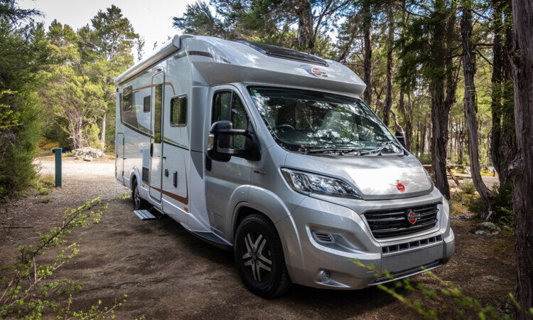 A motorhome camping at a DOC campground