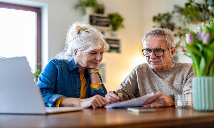 Older Couple looking at paperwork