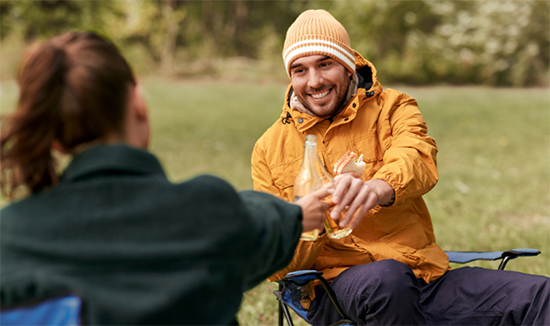 Drinking beer in camping chairs