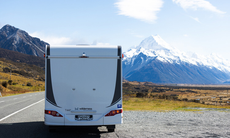 A motorhome parked at the side of a road