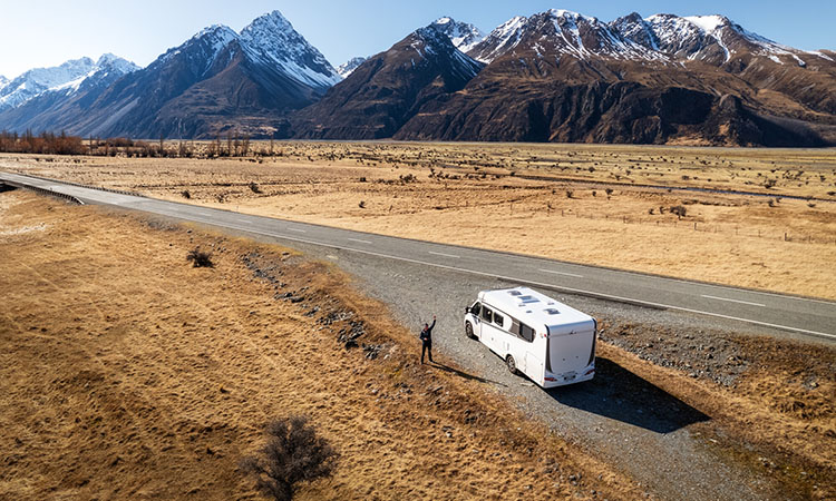 A motorhome stopping by at the side of the highway