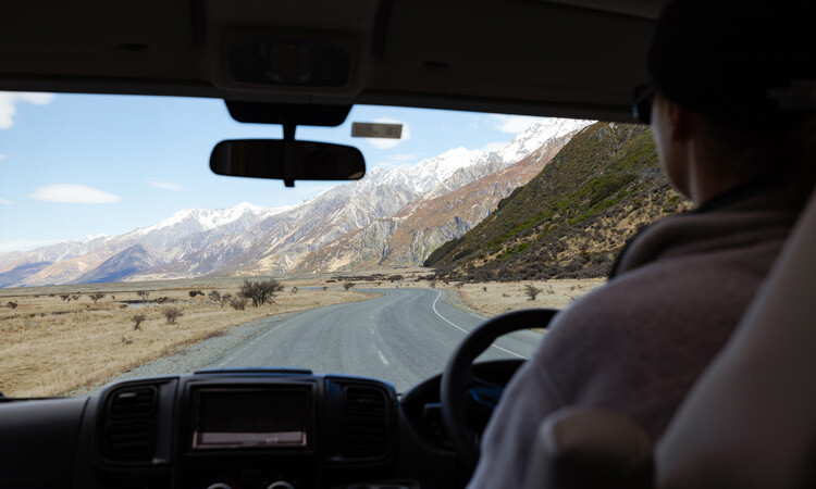 Driver driving a motorhome on a New Zealand highway